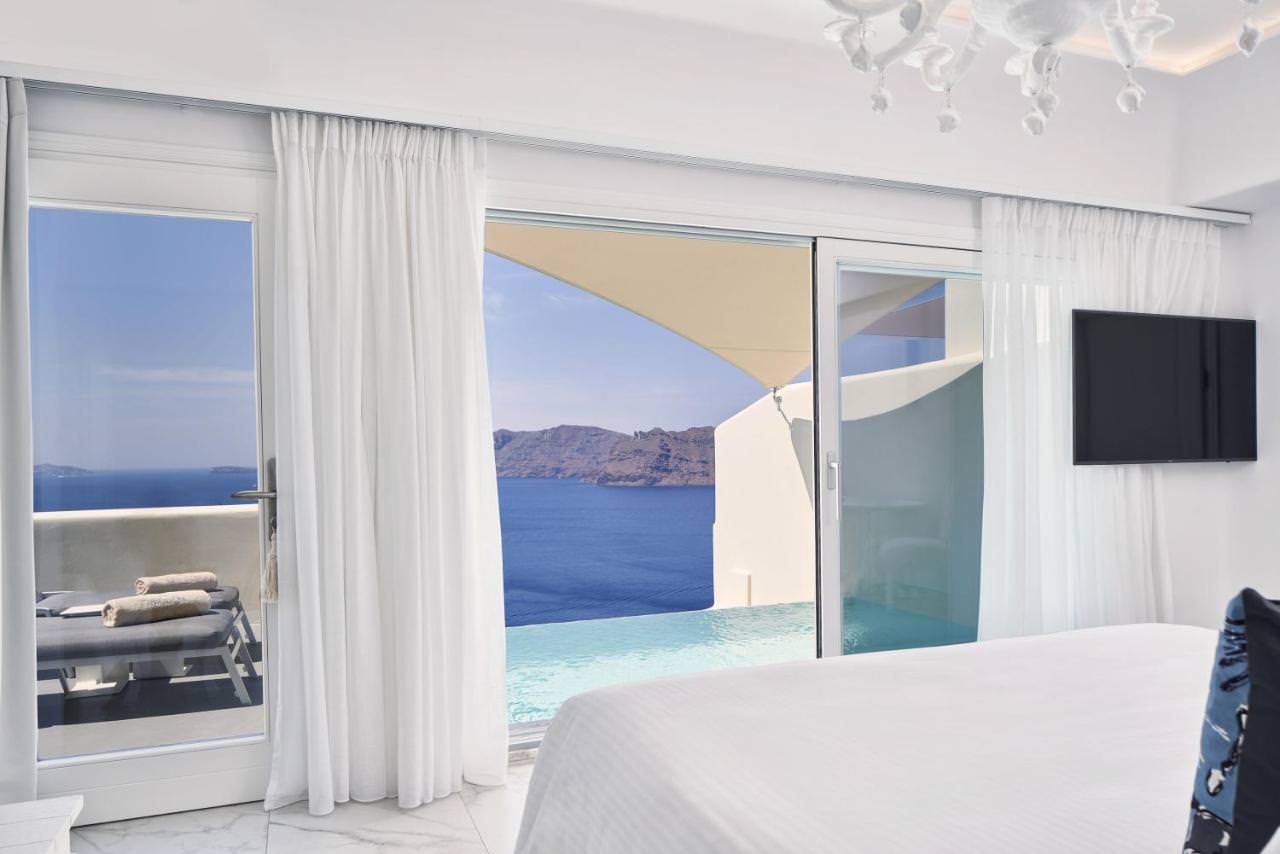 Views from the bedroom suite at Canaves Oia Suites overlooking the Caldera