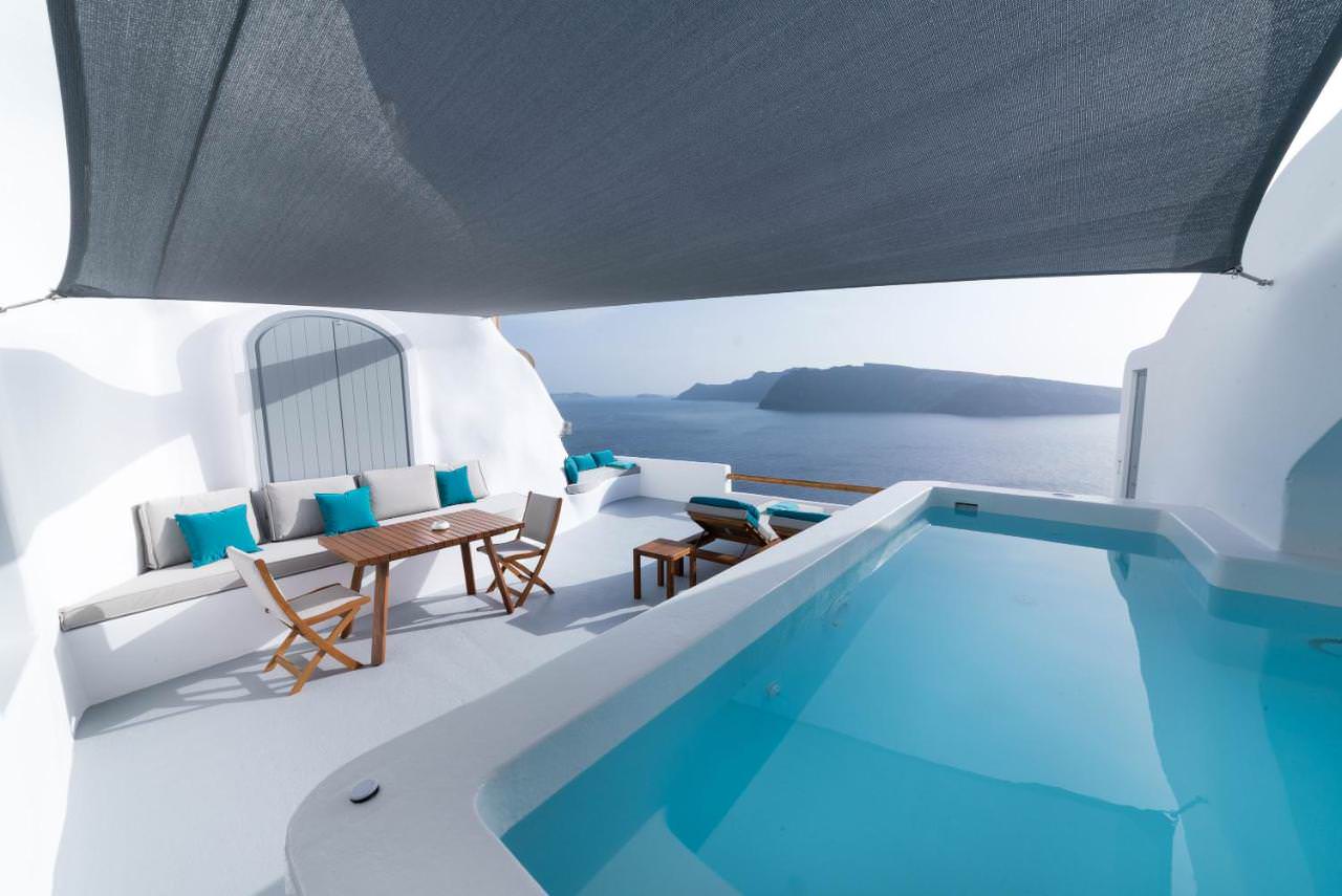 Outdoor private pool and seating at Maregio Suites
